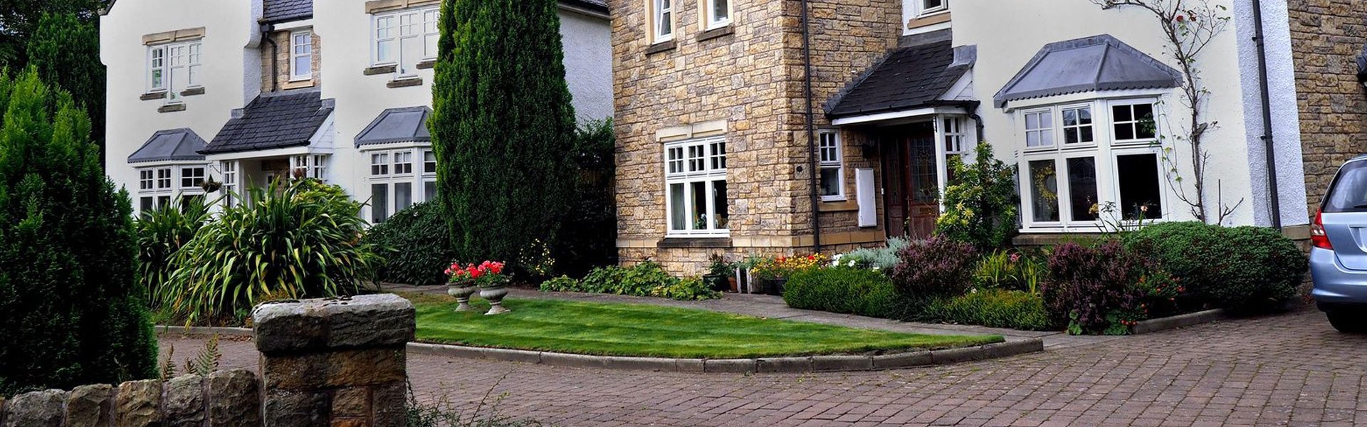 Block paved driveway and turning area to a stone house