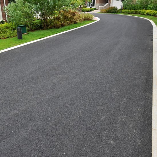Tarmac driveway laid and rolled with a kerb edge
